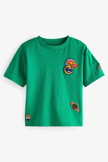 |Niño| Camiseta Varsity de manga corta - Insignias Verdes (3 meses a 7 años)