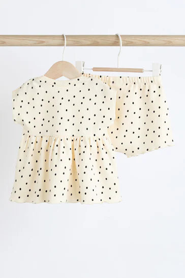 |Niña| Conjunto de 2 piezas de pantalón corto y top de canalé con peplum para bebé - Punto Blanco