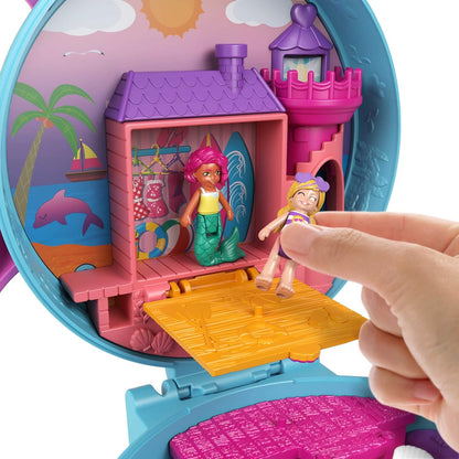 Polly Pocket Dolphin Beach Compact, tema de aventura na praia com boneca Micro Polly e sereia, 5 revelações e 12 acessórios, recurso pop e swap, ótimo presente para maiores de 4 anos, GTN20