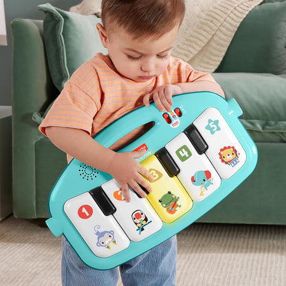 Fisher-Price Glow and Grow Kick &amp; Play Piano Gym, juguete musical portátil con etapas de aprendizaje inteligentes, edades 0+ meses, azul, versión en inglés Queens, HYH62