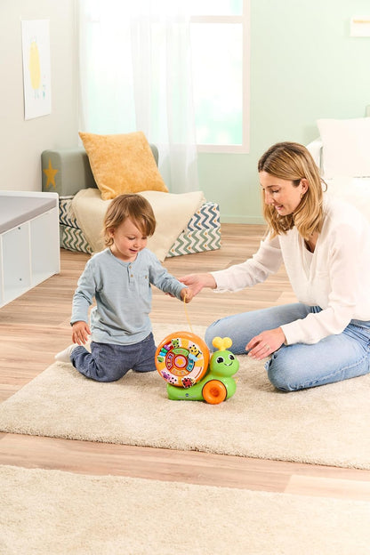 VTech  Baby Spinning Activity Snail, 4 botões iluminados ensinam letras, números, formas e cores, quadro de atividades com materiais manipuláveis e classificador de formas, brinquedo interativo para 12, 24 meses +, versão em inglês