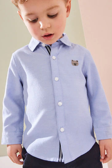 |Boy| Camisa Oxford De Manga Comprida - Personagem Azul (3 meses a 7 anos)