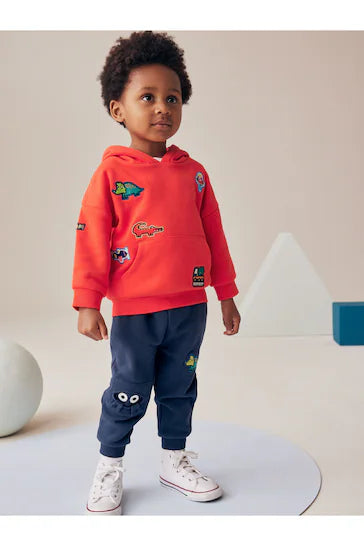 |Niño| Conjunto de sudadera y joggers con emblema de personaje en rojo/azul marino (3 meses a 7 años)