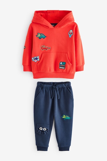 |Niño| Conjunto de sudadera y joggers con emblema de personaje en rojo/azul marino (3 meses a 7 años)