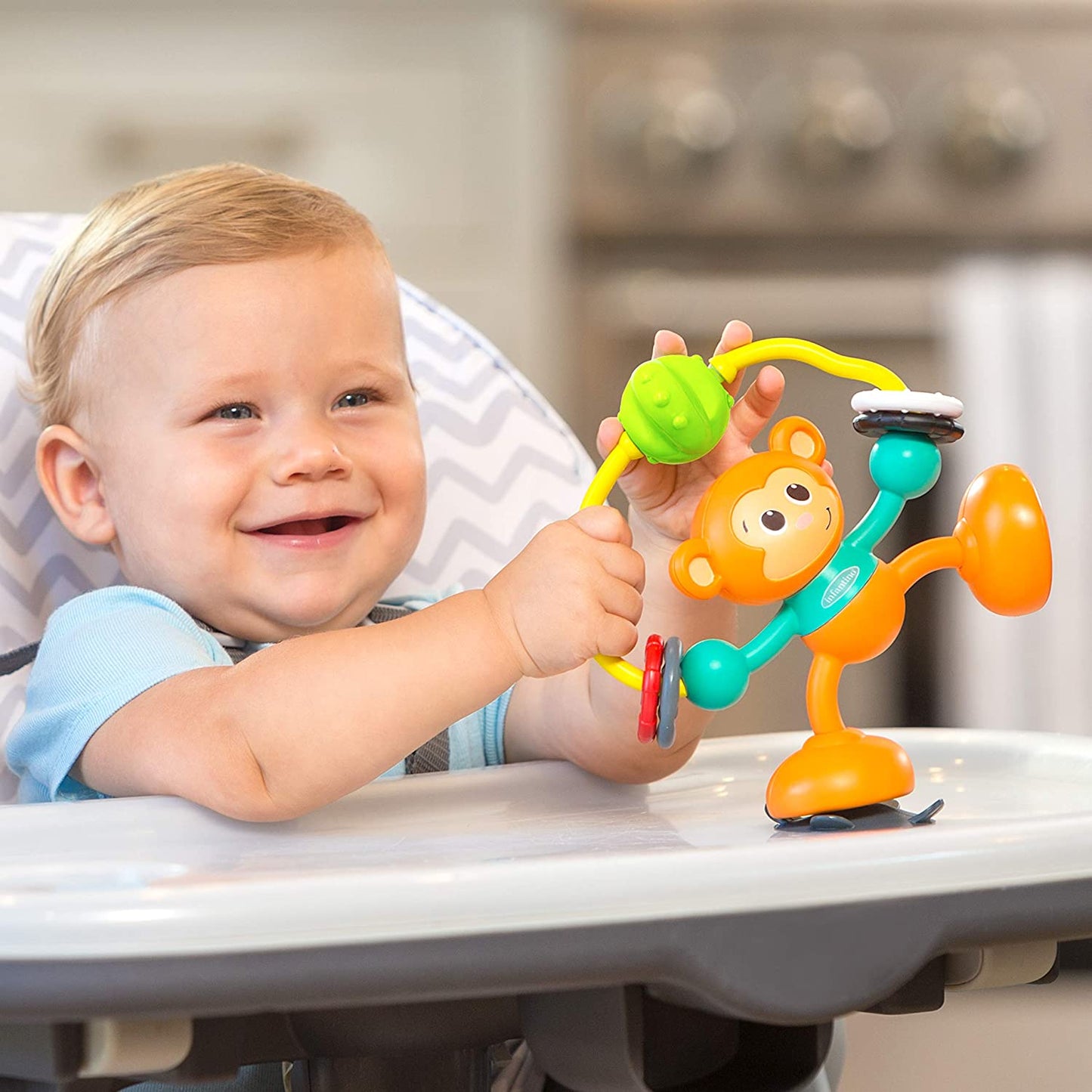 Infantino - Stick and Spin High Chair Pal